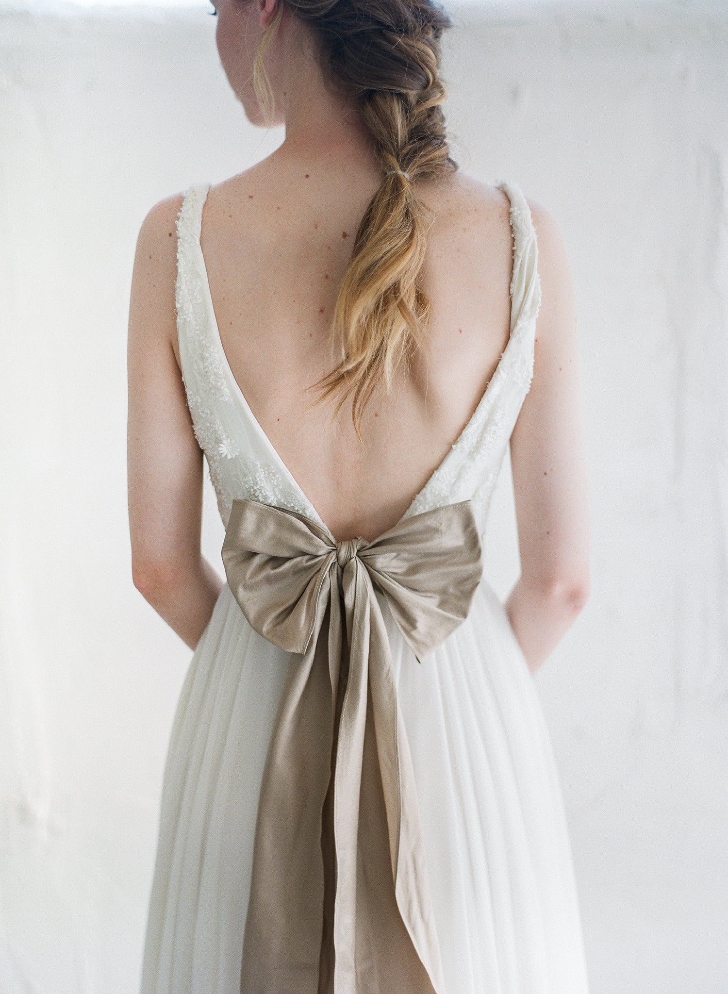 champagne toned silk bow sash for wedding dress